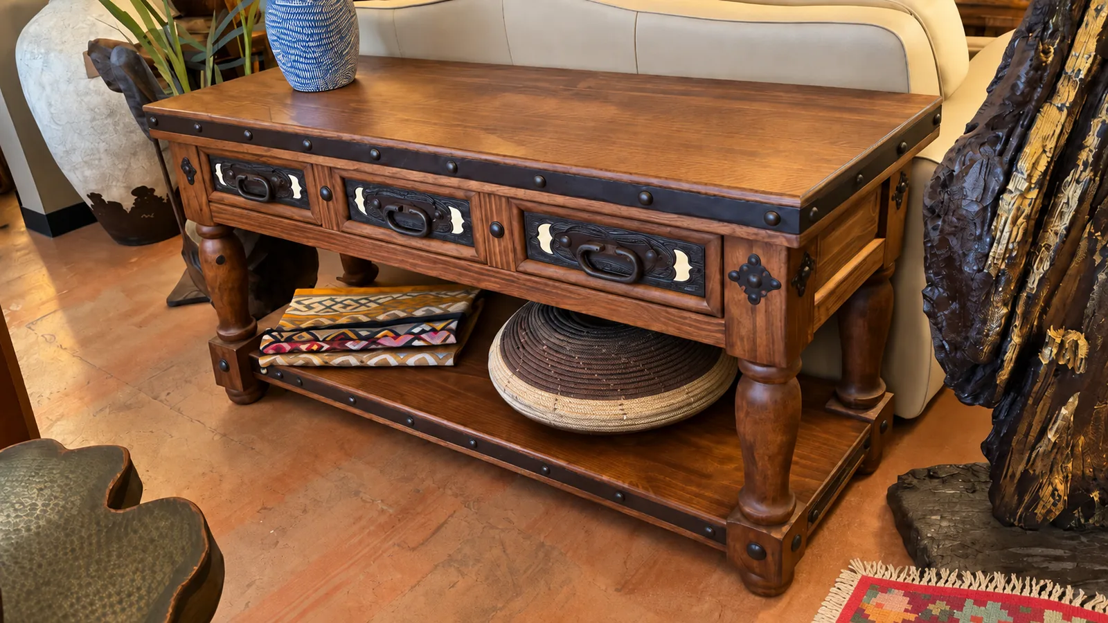 Hacienda Tooled Leather Sofa Table, staged in a room