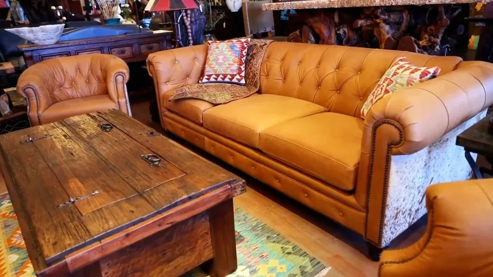 Leather sofa and trunk table in The Rustic Gallery showroom