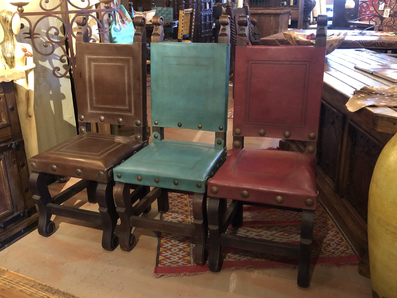 Argentina Tooled Leather Chairs in Café, Turquoise & Red Guinda