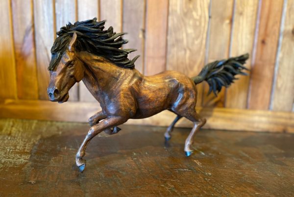 Hand Carved Galloping Mustang